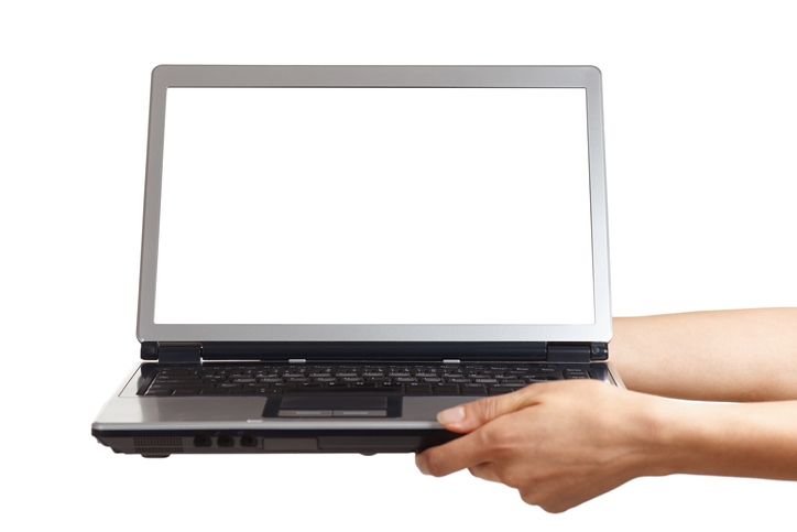 Hands holding a laptop